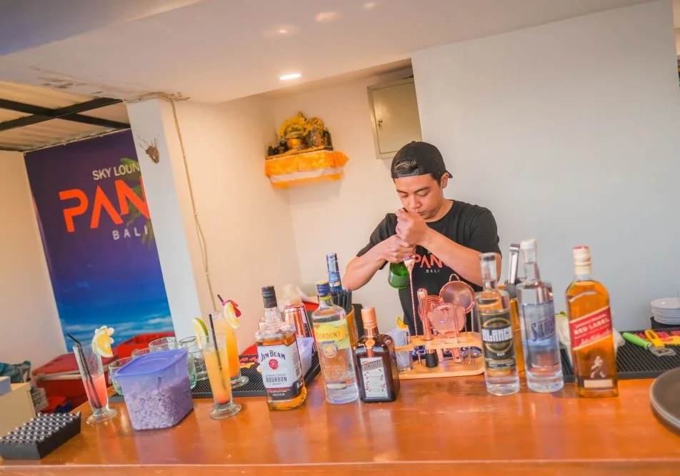 Pano Sky Lounge bartender and bar interior