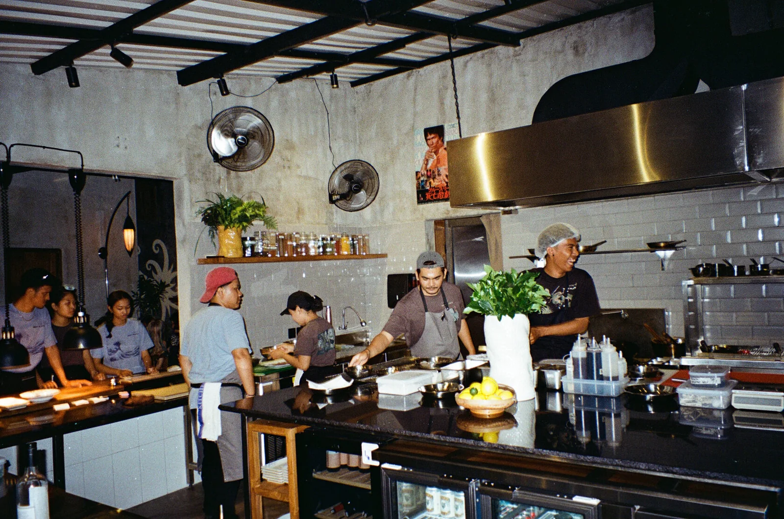Wet Plate Kitchen team working around the open kitchen in Ungasan